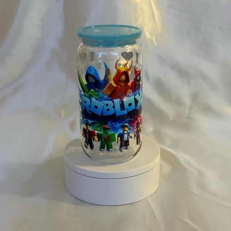 Beautiful Tumbler Displaying Blox with blue Lid and Straw Perfect for Kids and Adults Plastic.